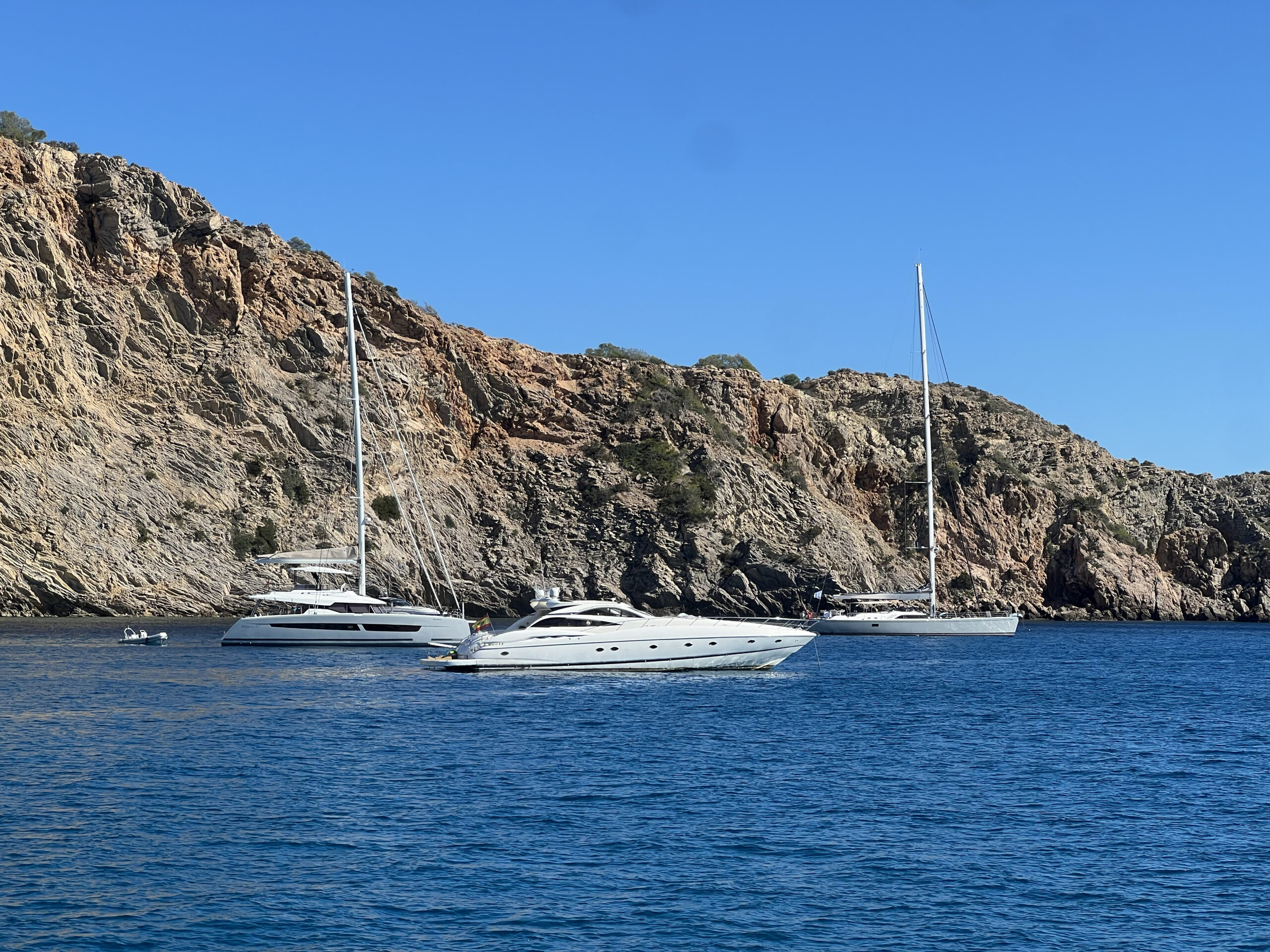 Yachts at anchorage in Cala Jondal (Ibiza)